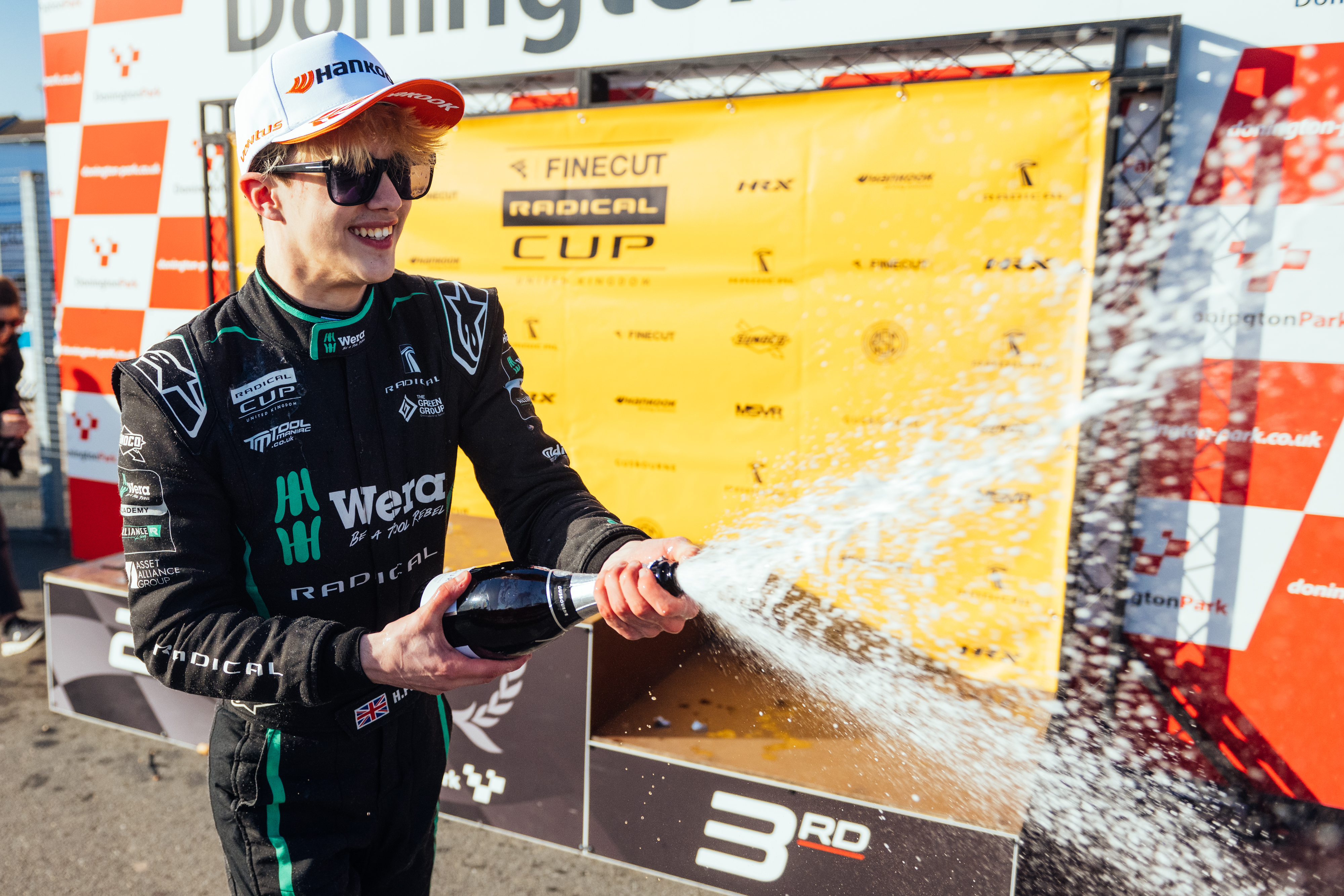 Hamish celebrating a podium at Donington Park Circuit